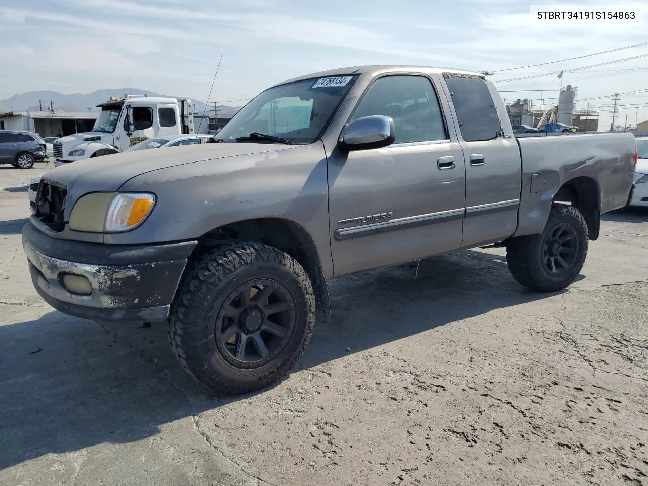 2001 Toyota Tundra Access Cab VIN: 5TBRT34191S154863 Lot: 74768134