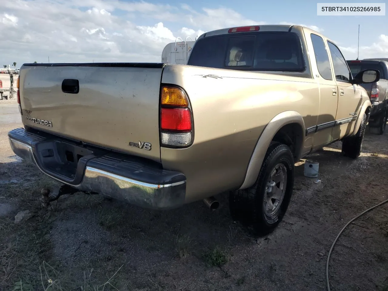 2002 Toyota Tundra Access Cab VIN: 5TBRT34102S266985 Lot: 77117034