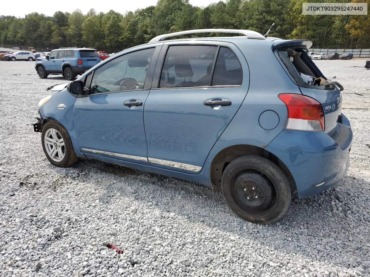 2009 Toyota Yaris VIN: JTDKT903295247440 Lot: 71163424