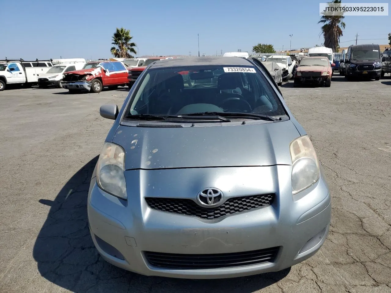 2009 Toyota Yaris VIN: JTDKT903X95223015 Lot: 73320854