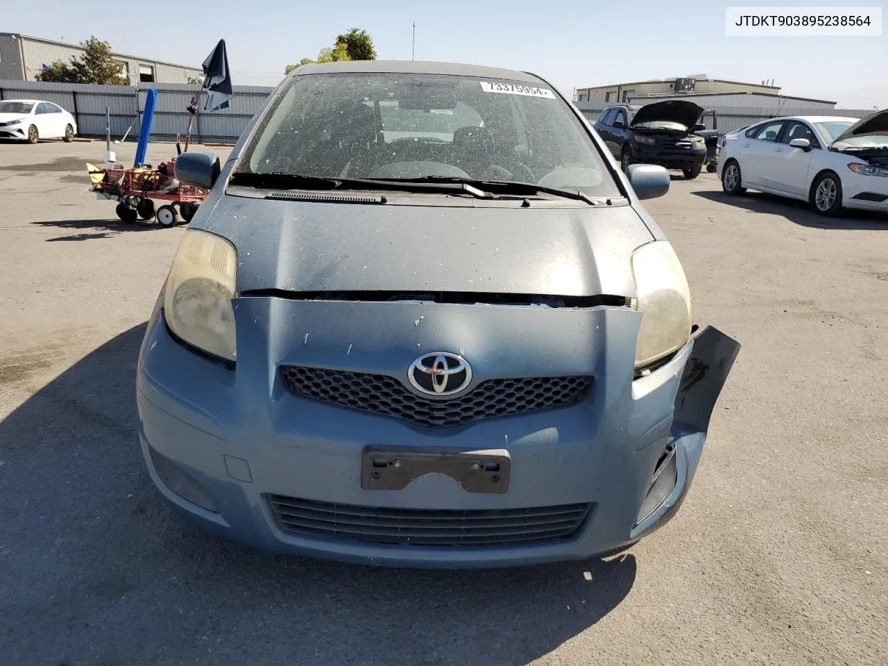 JTDKT903895238564 2009 Toyota Yaris