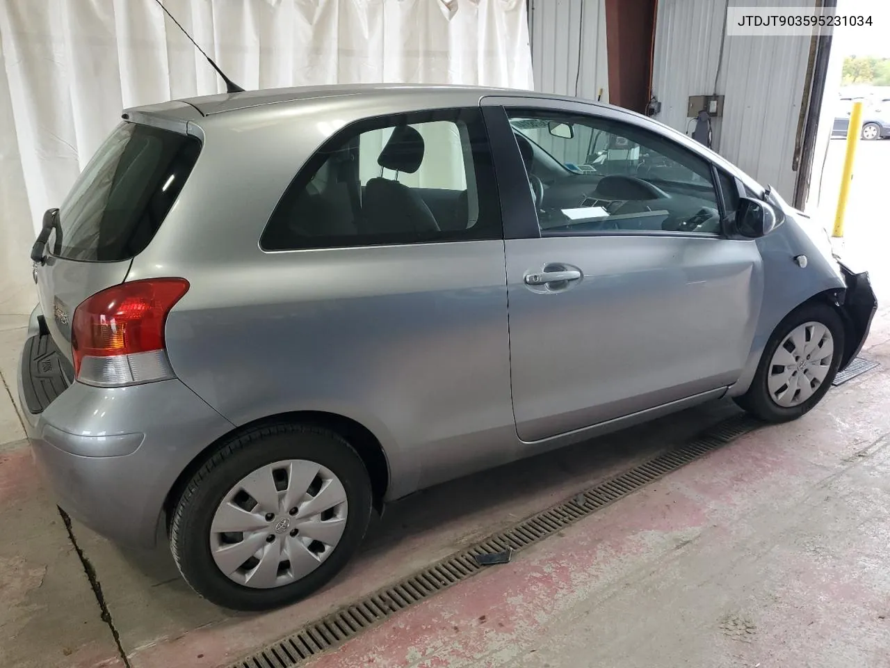 2009 Toyota Yaris VIN: JTDJT903595231034 Lot: 73575814