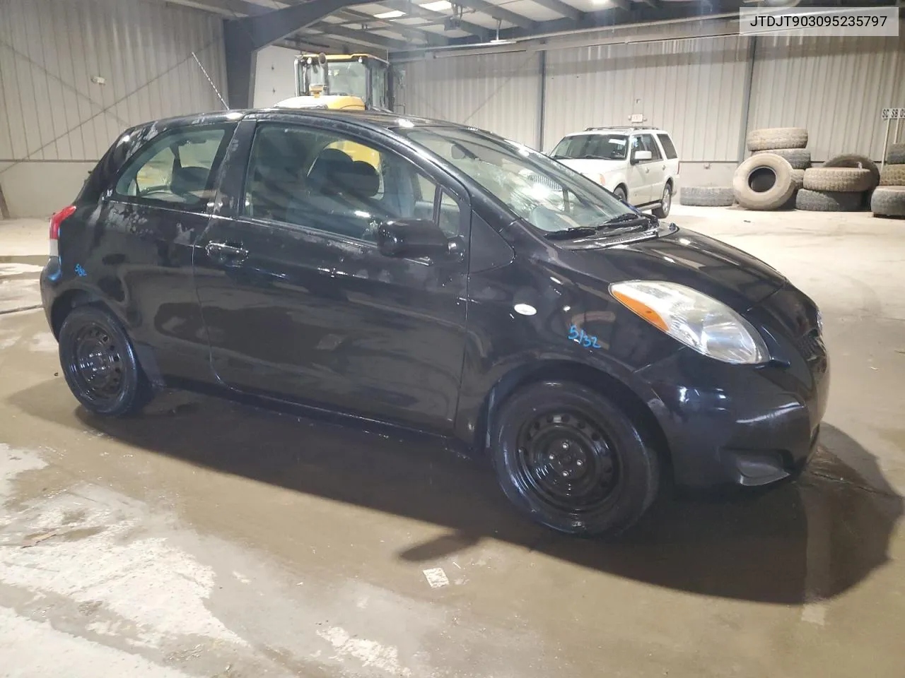 2009 Toyota Yaris VIN: JTDJT903095235797 Lot: 76673794