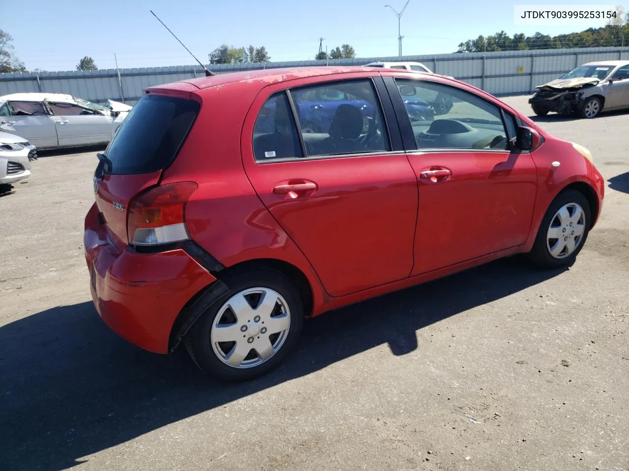 2009 Toyota Yaris VIN: JTDKT903995253154 Lot: 76682584