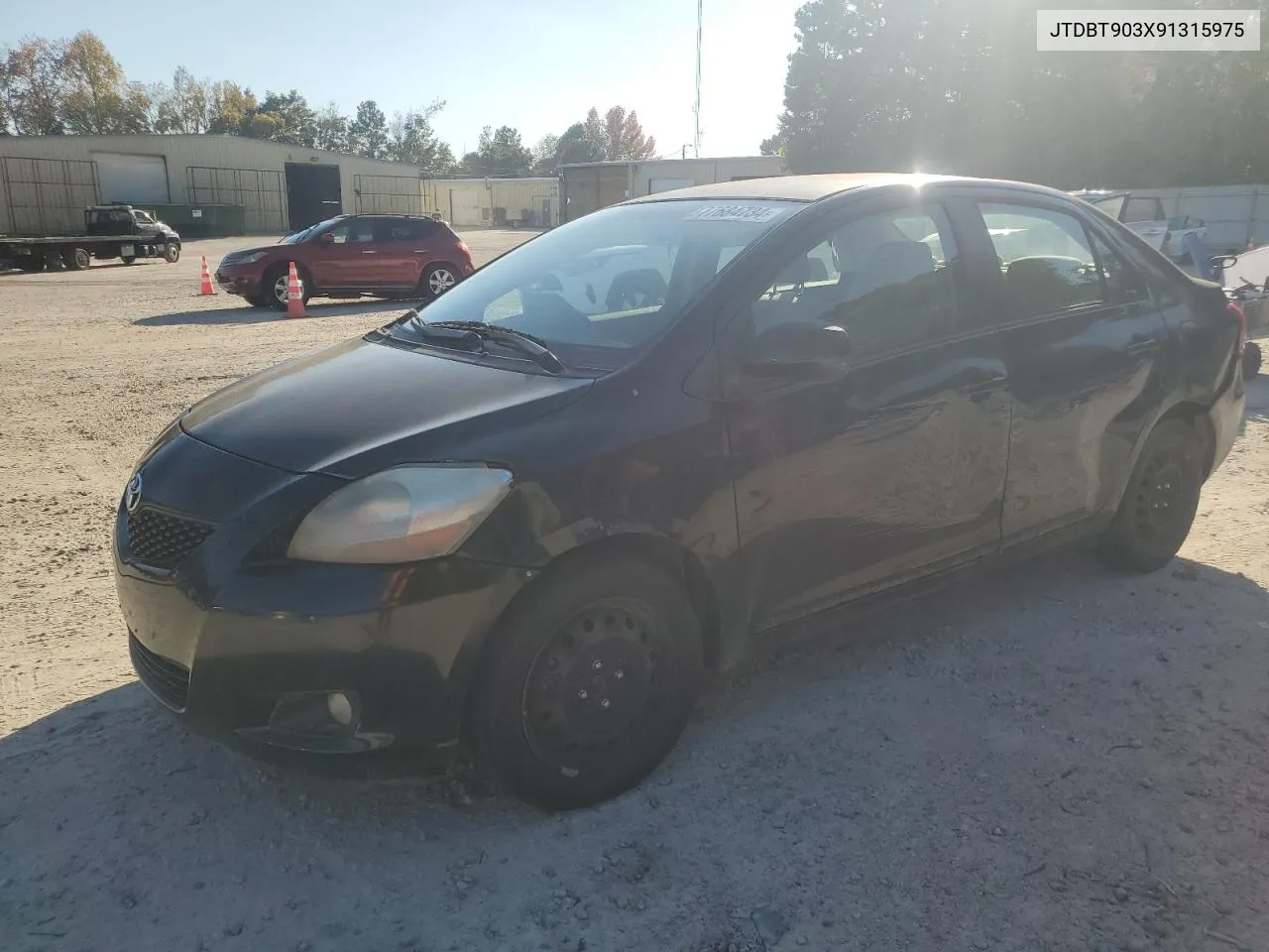 2009 Toyota Yaris VIN: JTDBT903X91315975 Lot: 77684734