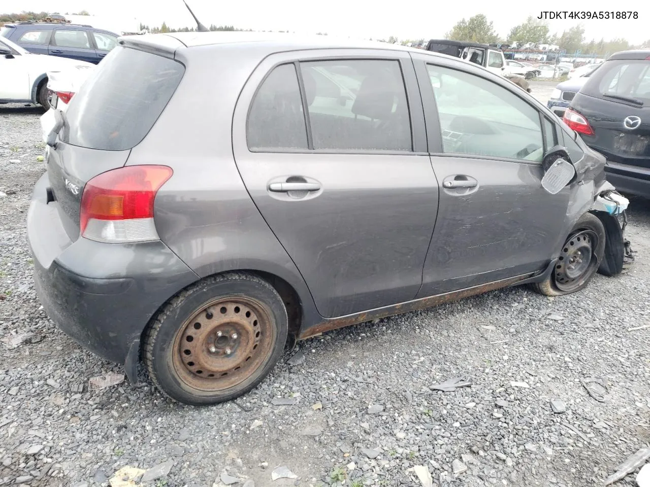 2010 Toyota Yaris VIN: JTDKT4K39A5318878 Lot: 72218424