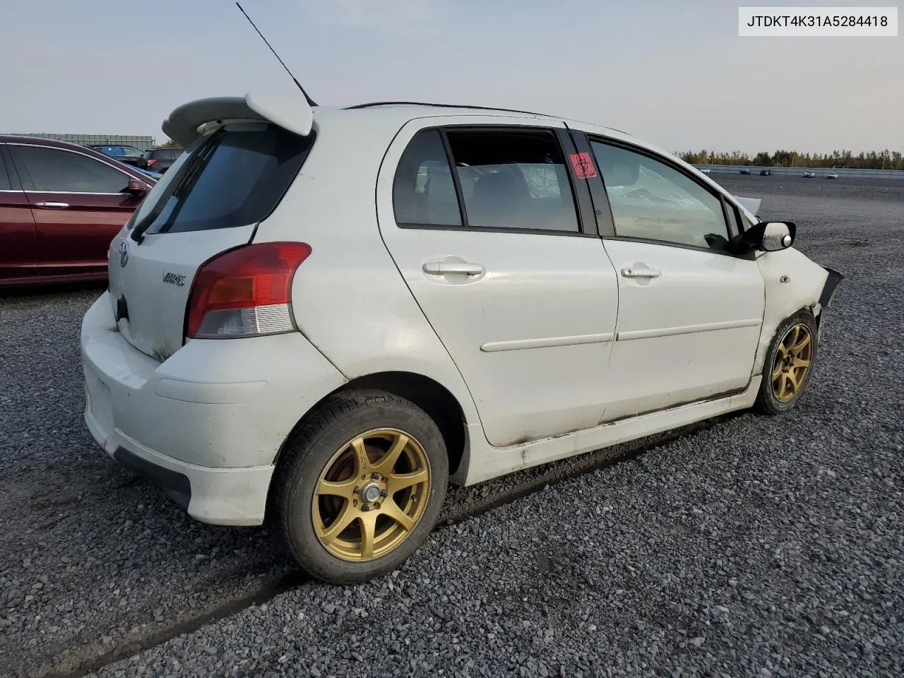 2010 Toyota Yaris VIN: JTDKT4K31A5284418 Lot: 74913934