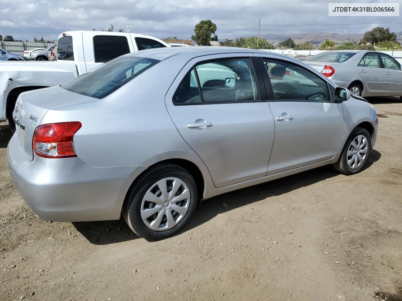 2011 Toyota Yaris VIN: JTDBT4K31BL006566 Lot: 71685874