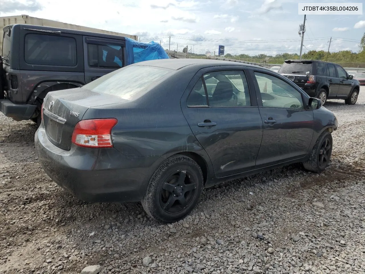 2011 Toyota Yaris VIN: JTDBT4K35BL004206 Lot: 74108194