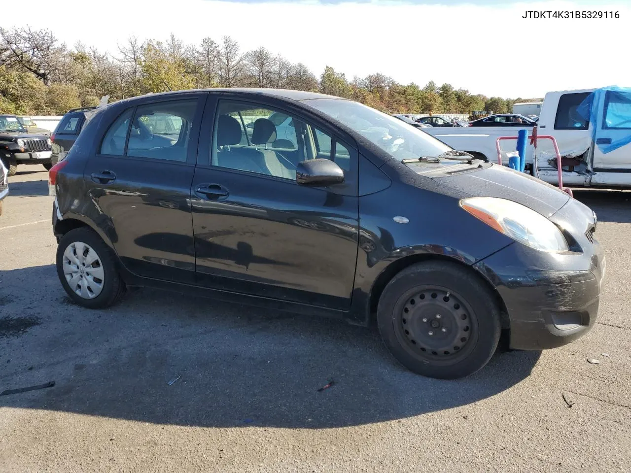 2011 Toyota Yaris VIN: JTDKT4K31B5329116 Lot: 75588974