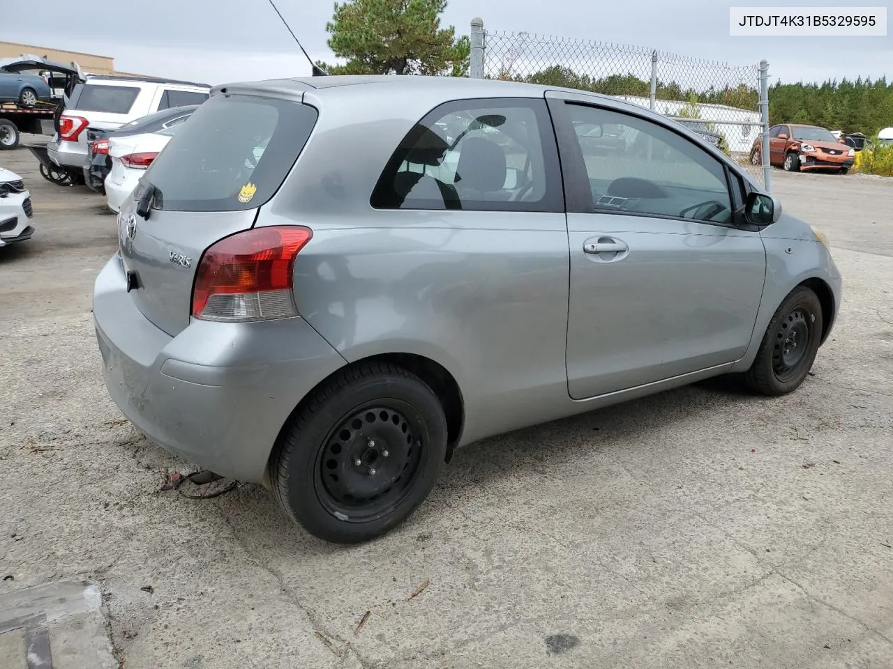 2011 Toyota Yaris VIN: JTDJT4K31B5329595 Lot: 77556904