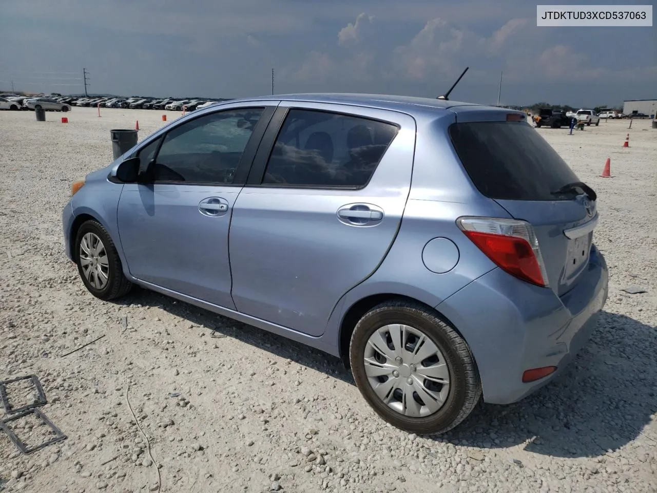 2012 Toyota Yaris VIN: JTDKTUD3XCD537063 Lot: 66871794