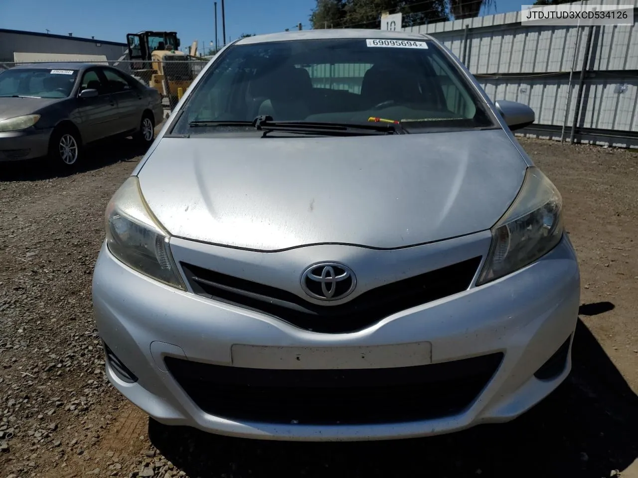 2012 Toyota Yaris VIN: JTDJTUD3XCD534126 Lot: 69095694