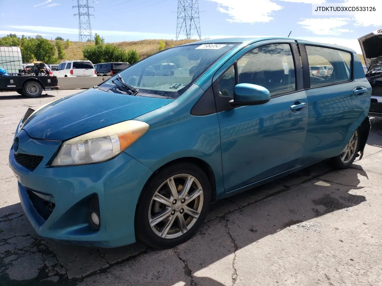 2012 Toyota Yaris VIN: JTDKTUD3XCD533126 Lot: 71964054