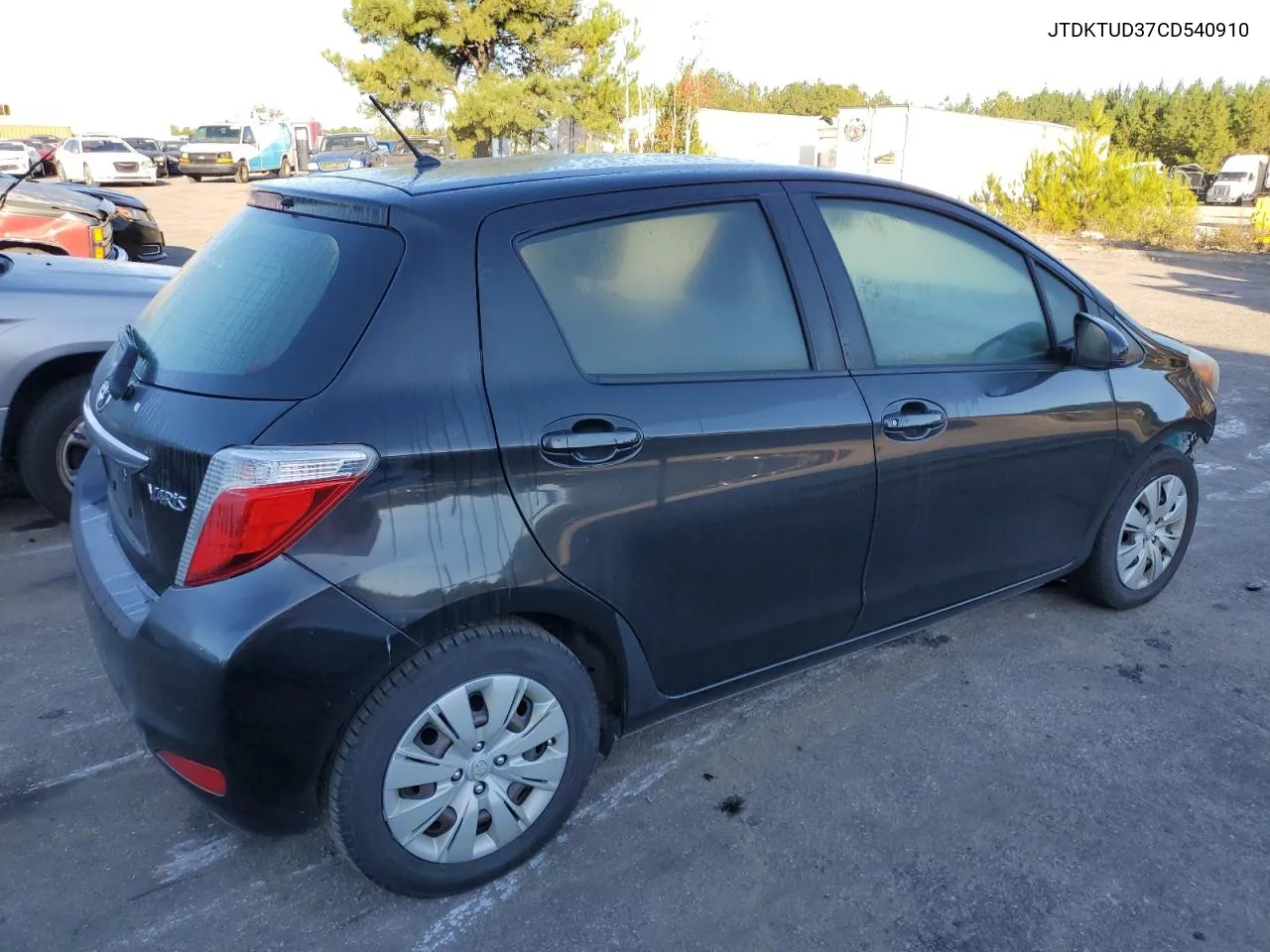 2012 Toyota Yaris VIN: JTDKTUD37CD540910 Lot: 76585474