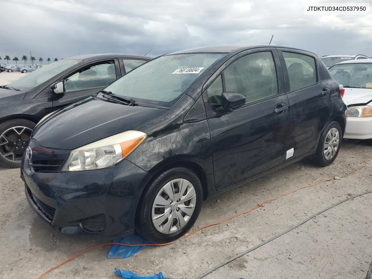 2012 Toyota Yaris VIN: JTDKTUD34CD537950 Lot: 76818604