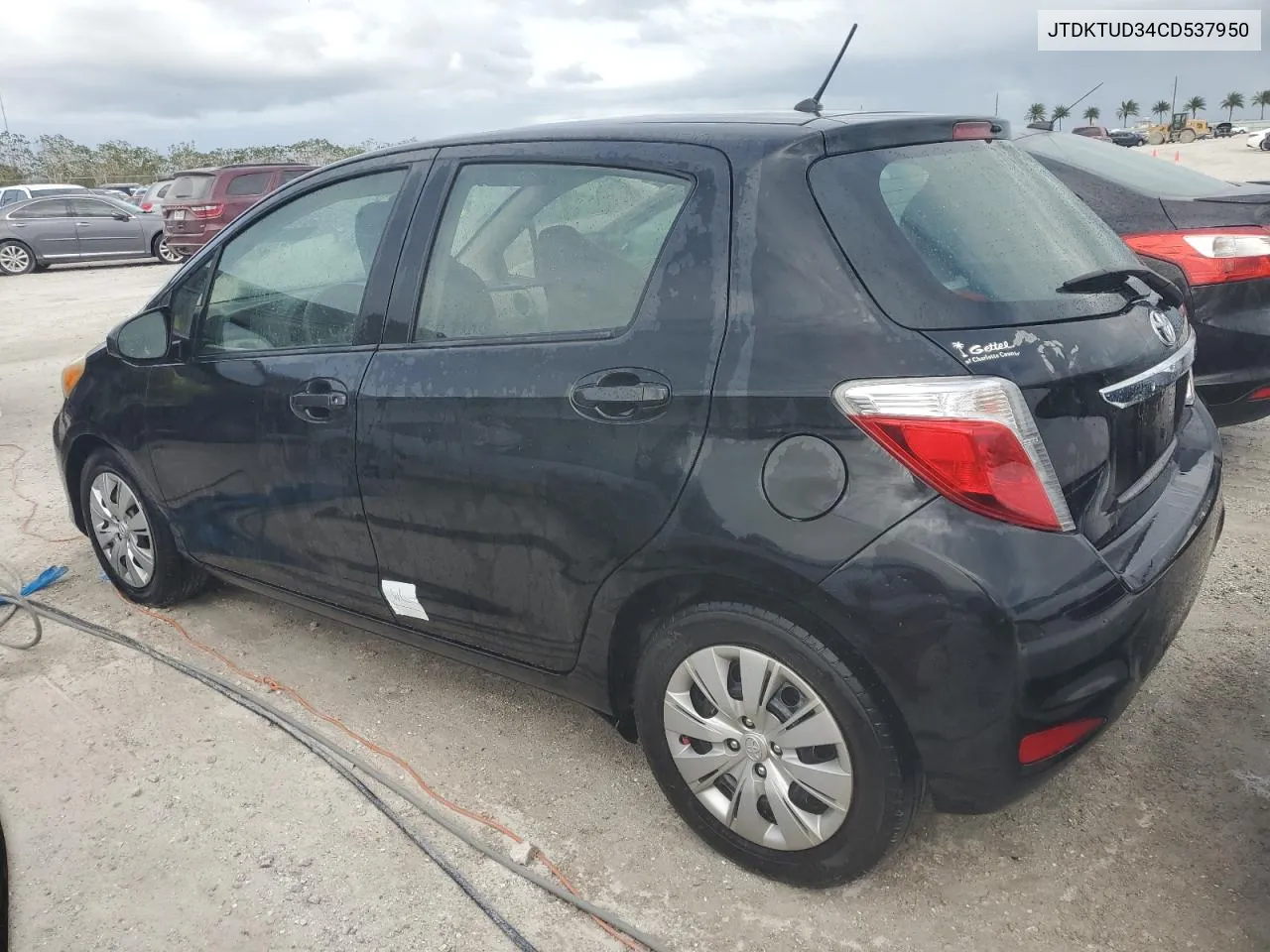 2012 Toyota Yaris VIN: JTDKTUD34CD537950 Lot: 76818604