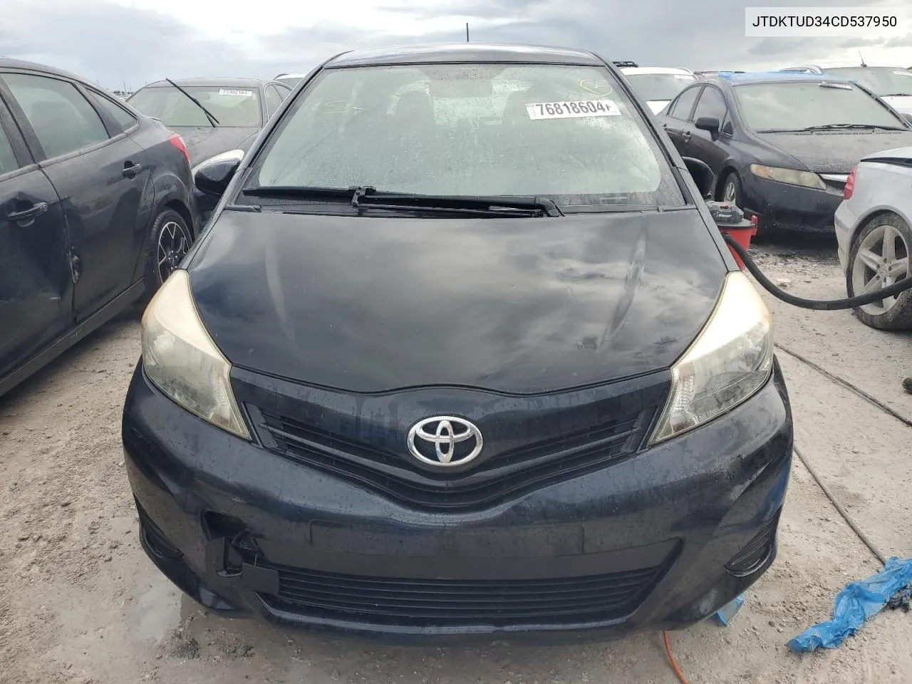 2012 Toyota Yaris VIN: JTDKTUD34CD537950 Lot: 76818604