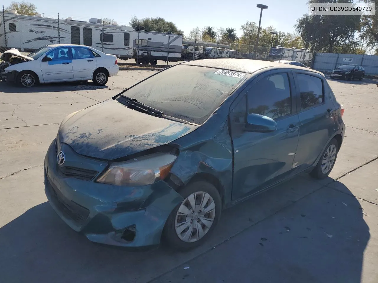 2012 Toyota Yaris VIN: JTDKTUD39CD540729 Lot: 76951674