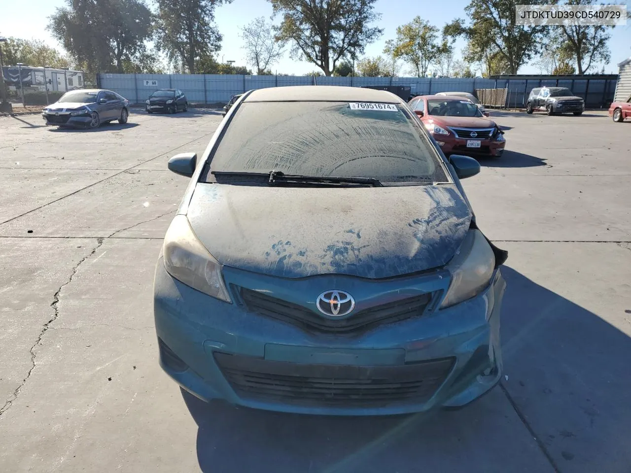 2012 Toyota Yaris VIN: JTDKTUD39CD540729 Lot: 76951674