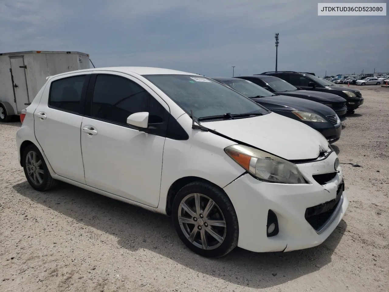 2012 Toyota Yaris VIN: JTDKTUD36CD523080 Lot: 77607654