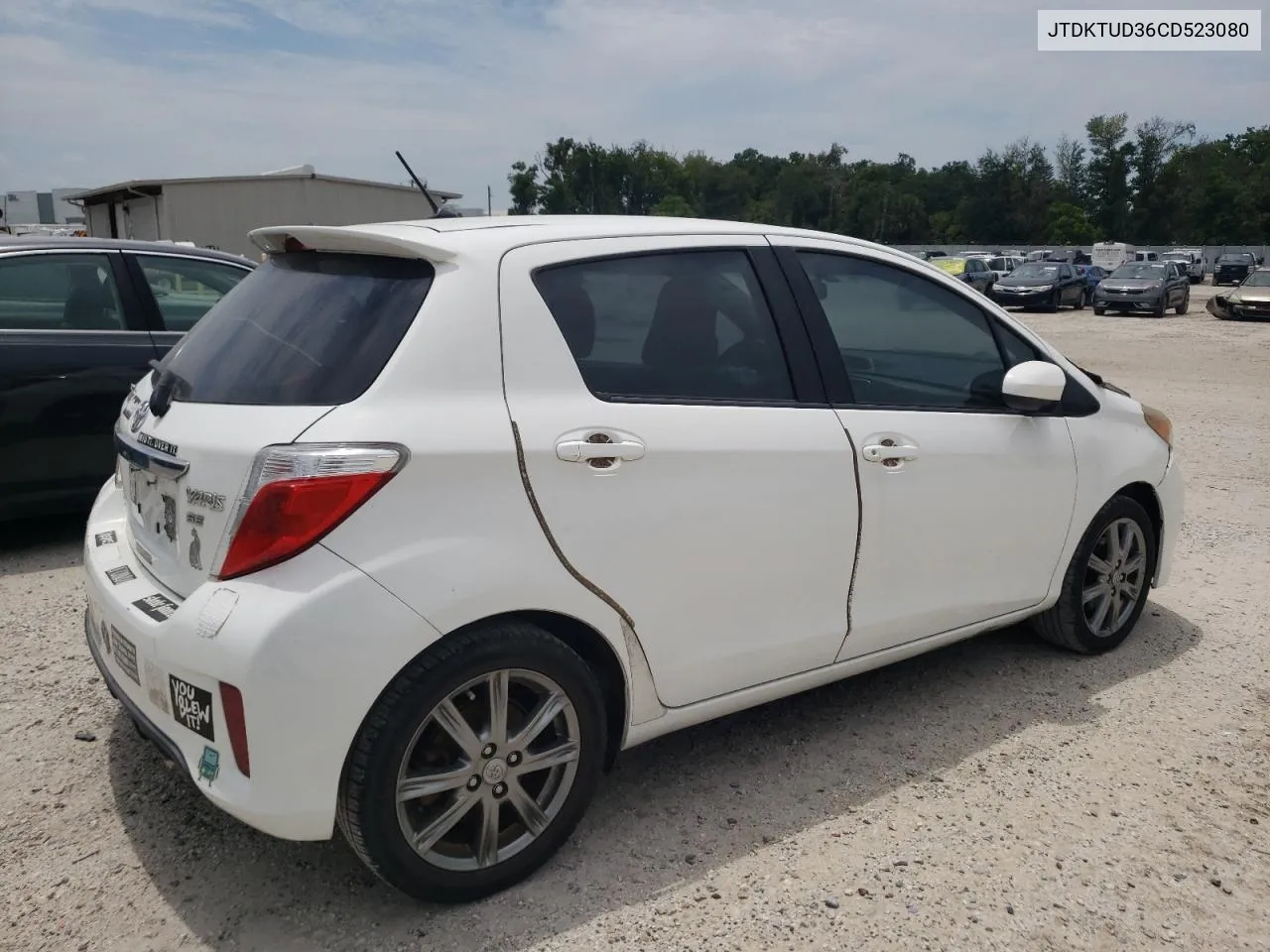 2012 Toyota Yaris VIN: JTDKTUD36CD523080 Lot: 77607654