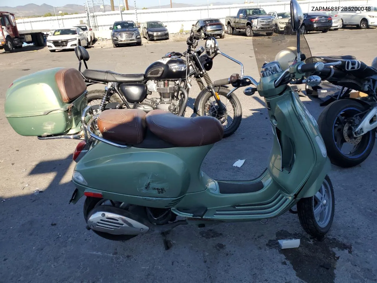 2011 Vespa Lx 150Ie VIN: ZAPM688F2B5200048 Lot: 74596574