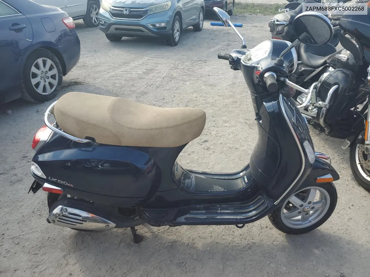 2012 Vespa Lx 150Ie VIN: ZAPM688FXC5002268 Lot: 76695004