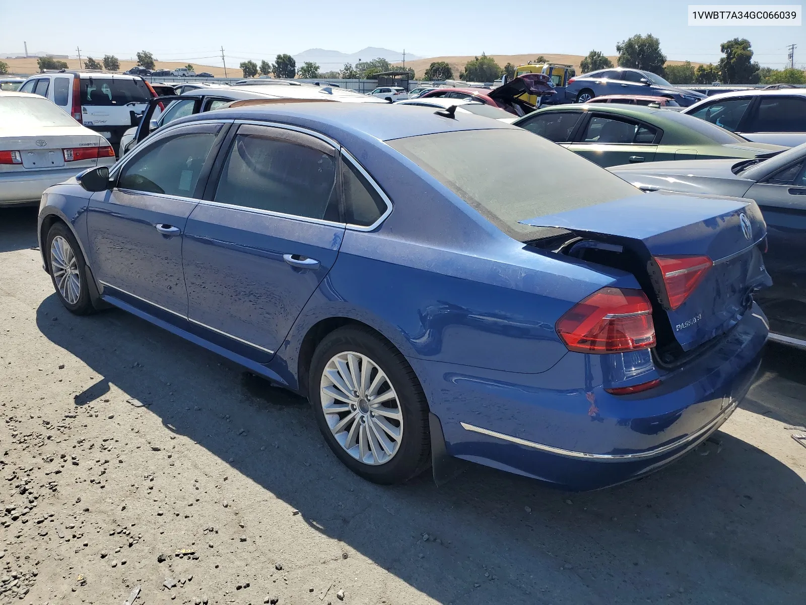 2016 Volkswagen Passat Se VIN: 1VWBT7A34GC066039 Lot: 66429554