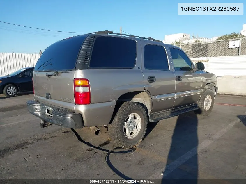 2002 Chevrolet Tahoe Lt VIN: 1GNEC13TX2R280587 Lot: 40712711