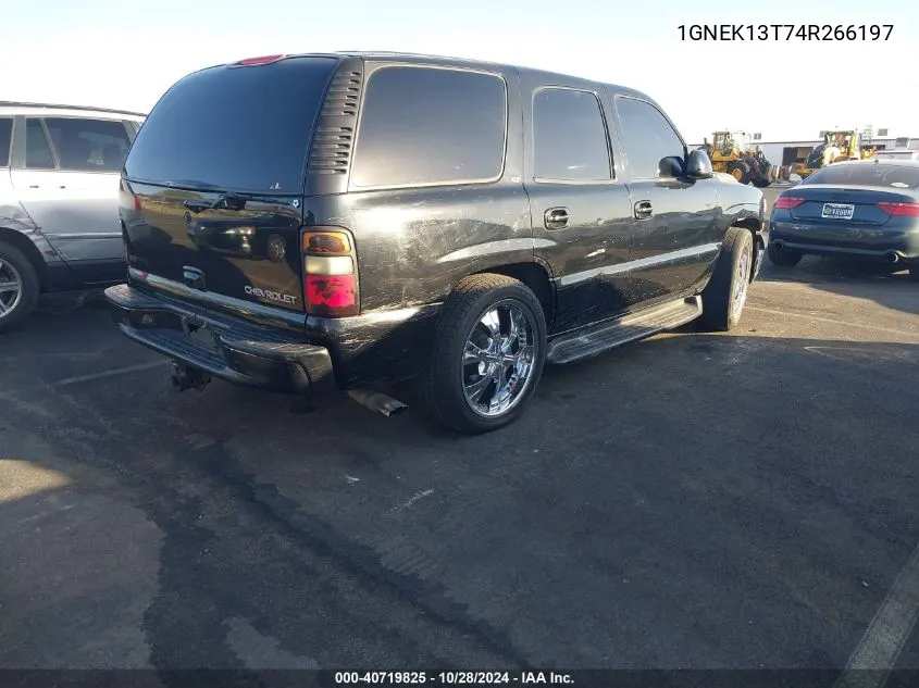 2004 Chevrolet Tahoe Lt VIN: 1GNEK13T74R266197 Lot: 40719825