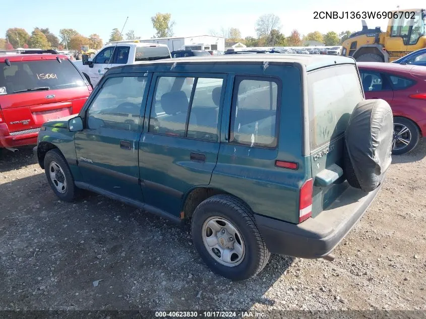 1998 Chevrolet Tracker VIN: 2CNBJ1363W6906702 Lot: 40623830