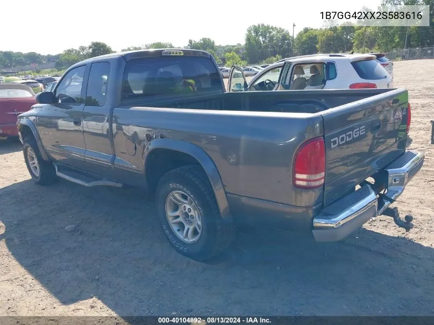 2002 Dodge Dakota Slt VIN: 1B7GG42XX2S583616 Lot: 40104892