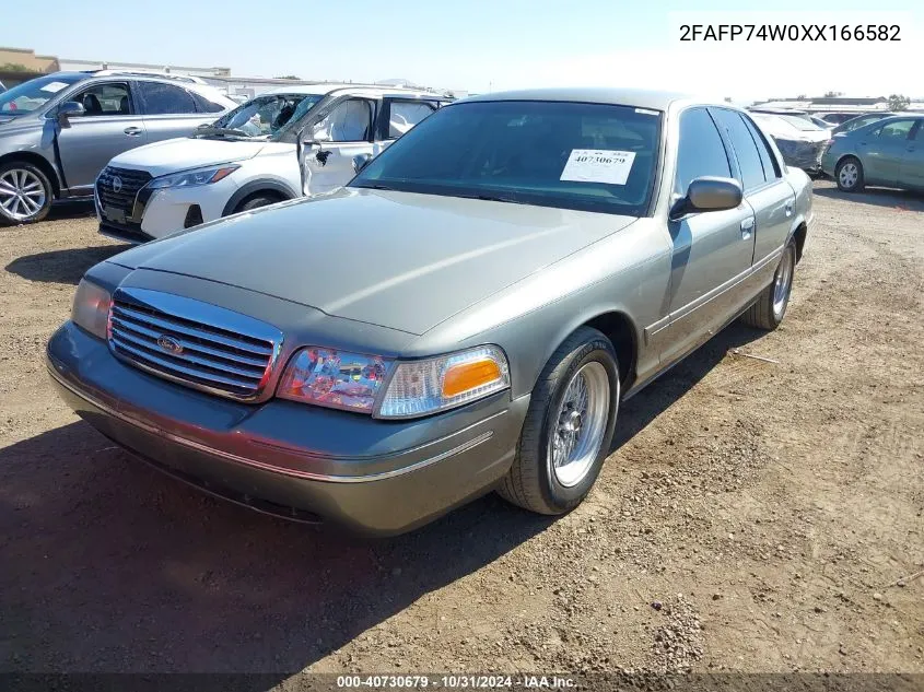 1999 Ford Crown Victoria Lx VIN: 2FAFP74W0XX166582 Lot: 40730679