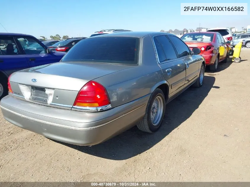 1999 Ford Crown Victoria Lx VIN: 2FAFP74W0XX166582 Lot: 40730679