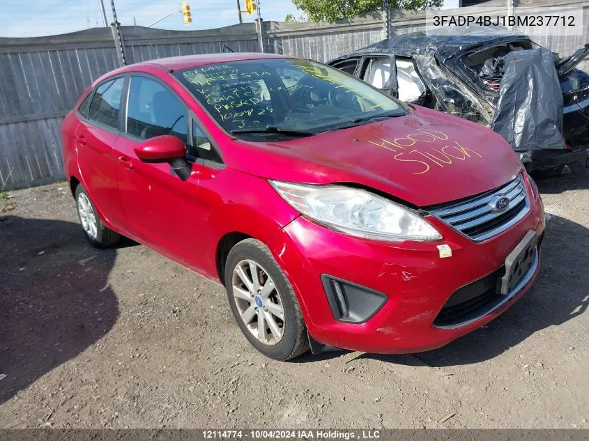 2011 Ford Fiesta VIN: 3FADP4BJ1BM237712 Lot: 12114774