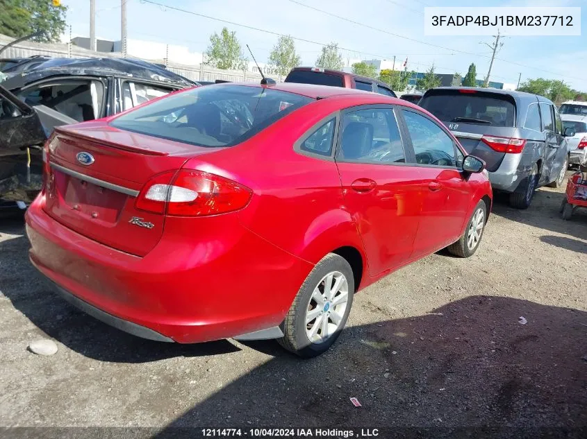 2011 Ford Fiesta VIN: 3FADP4BJ1BM237712 Lot: 12114774