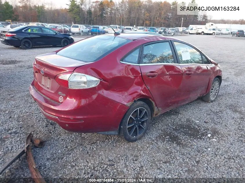 2016 Ford Fiesta Titanium VIN: 3FADP4CJ0GM163284 Lot: 40754984