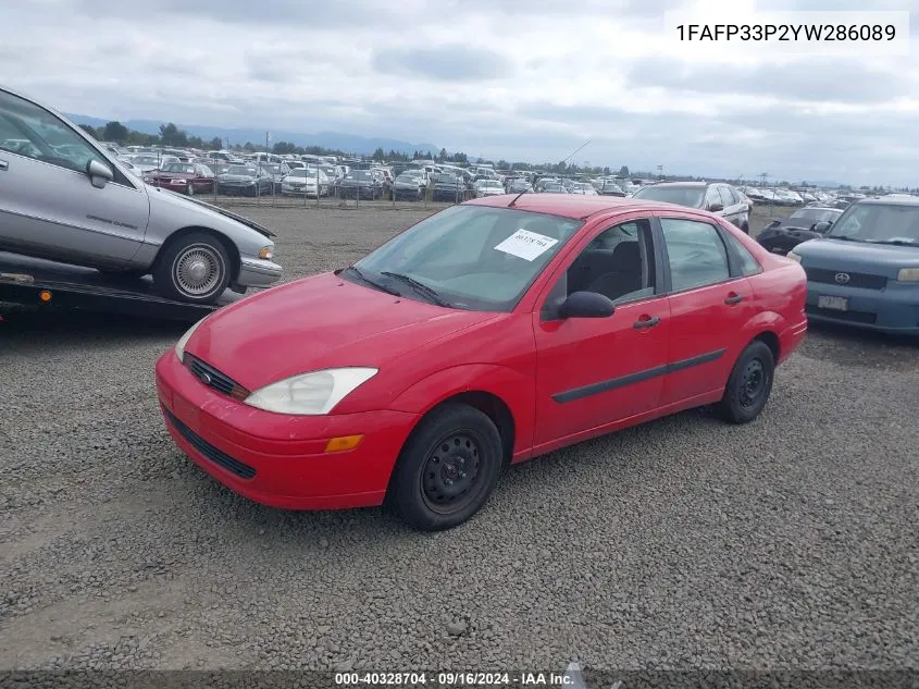 2000 Ford Focus Lx VIN: 1FAFP33P2YW286089 Lot: 40328704