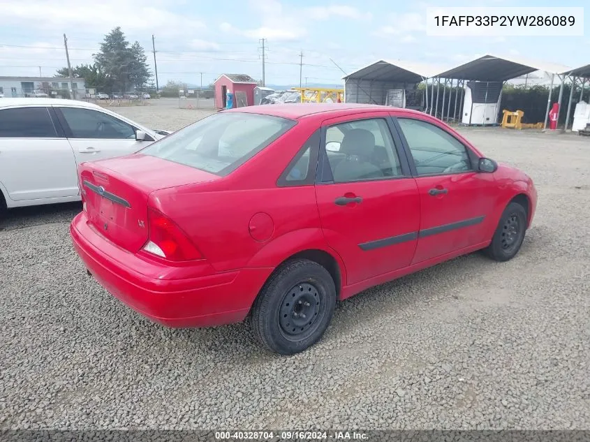 2000 Ford Focus Lx VIN: 1FAFP33P2YW286089 Lot: 40328704