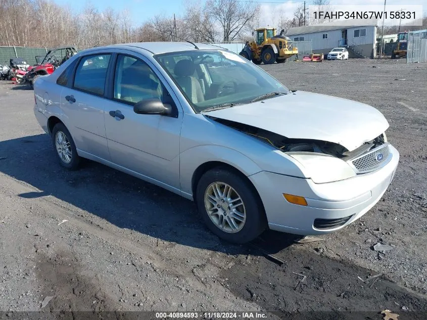 2007 Ford Focus S/Se/Ses VIN: 1FAHP34N67W158331 Lot: 40894593