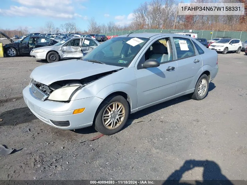 2007 Ford Focus S/Se/Ses VIN: 1FAHP34N67W158331 Lot: 40894593