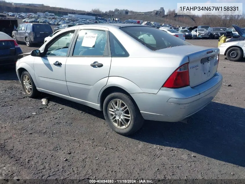 2007 Ford Focus S/Se/Ses VIN: 1FAHP34N67W158331 Lot: 40894593