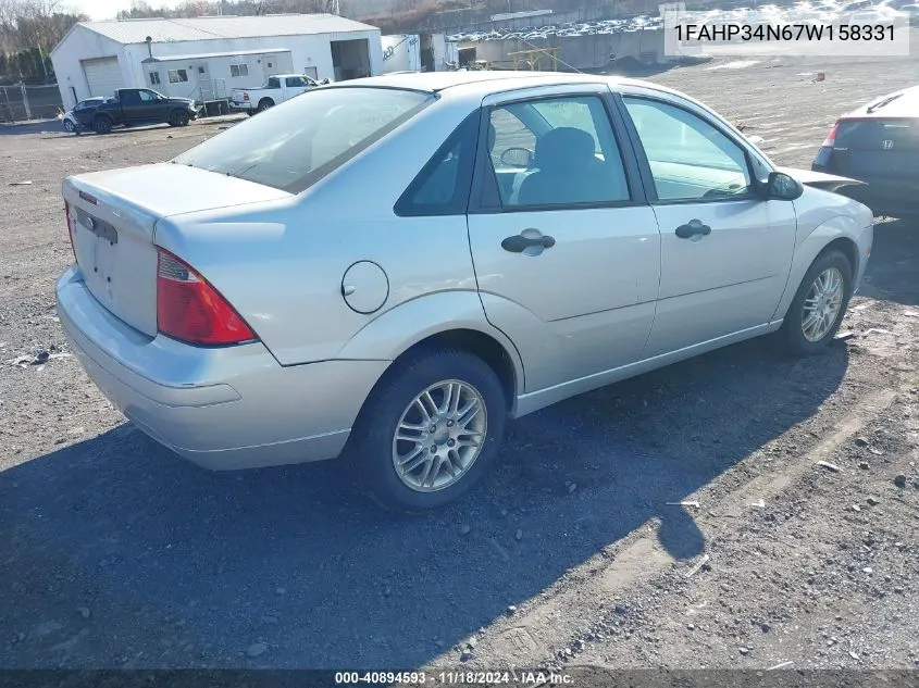 2007 Ford Focus S/Se/Ses VIN: 1FAHP34N67W158331 Lot: 40894593