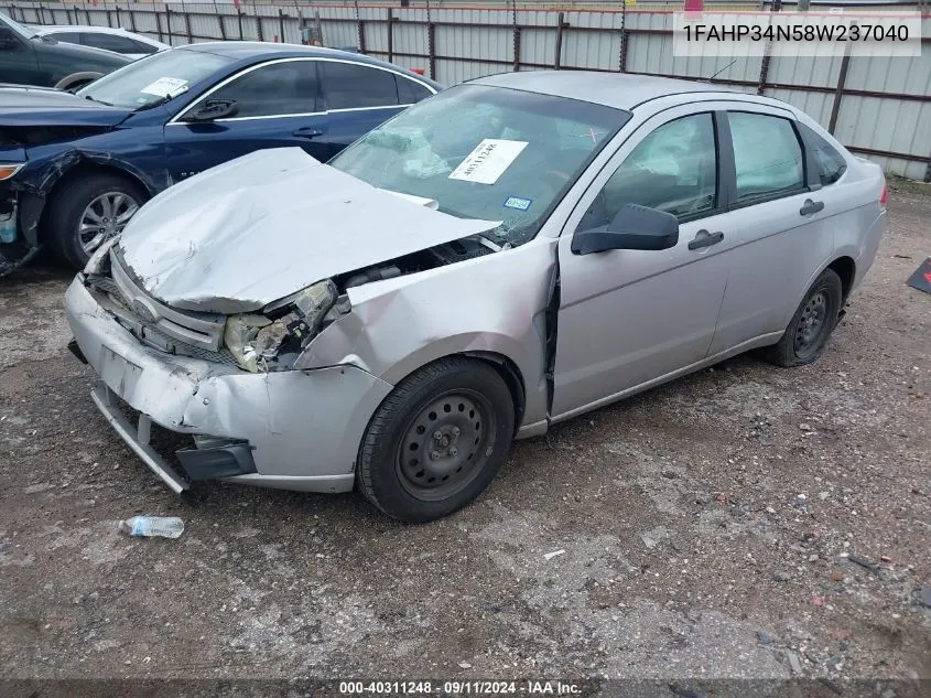 2008 Ford Focus S VIN: 1FAHP34N58W237040 Lot: 40311248