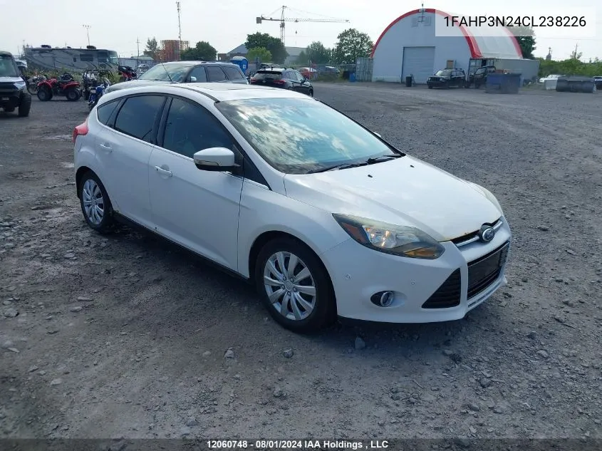 2012 Ford Focus Titanium VIN: 1FAHP3N24CL238226 Lot: 12060748