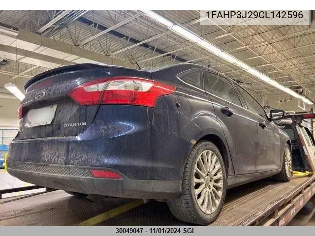 2012 Ford Focus Titanium VIN: 1FAHP3J29CL142596 Lot: 30049047