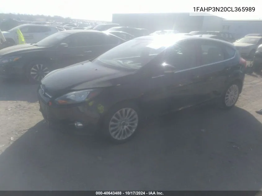 2012 Ford Focus Titanium VIN: 1FAHP3N20CL365989 Lot: 40643488