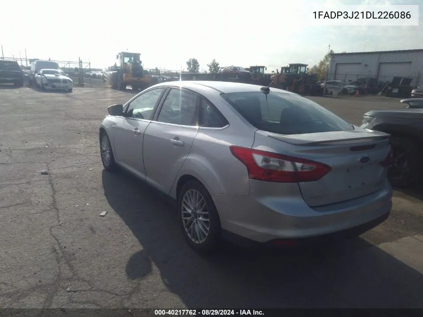 2013 Ford Focus Titanium VIN: 1FADP3J21DL226086 Lot: 40217762