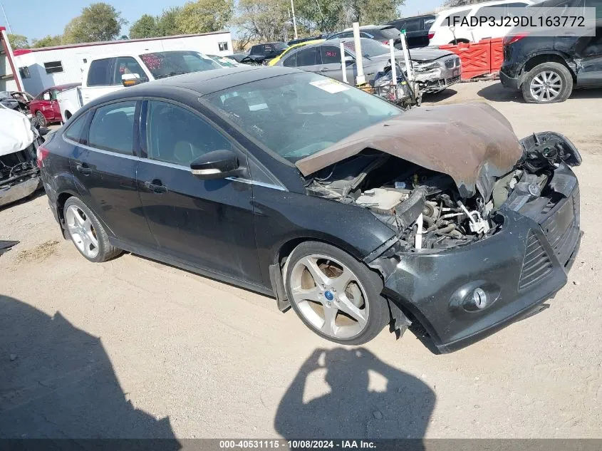 2013 Ford Focus Titanium VIN: 1FADP3J29DL163772 Lot: 40531115